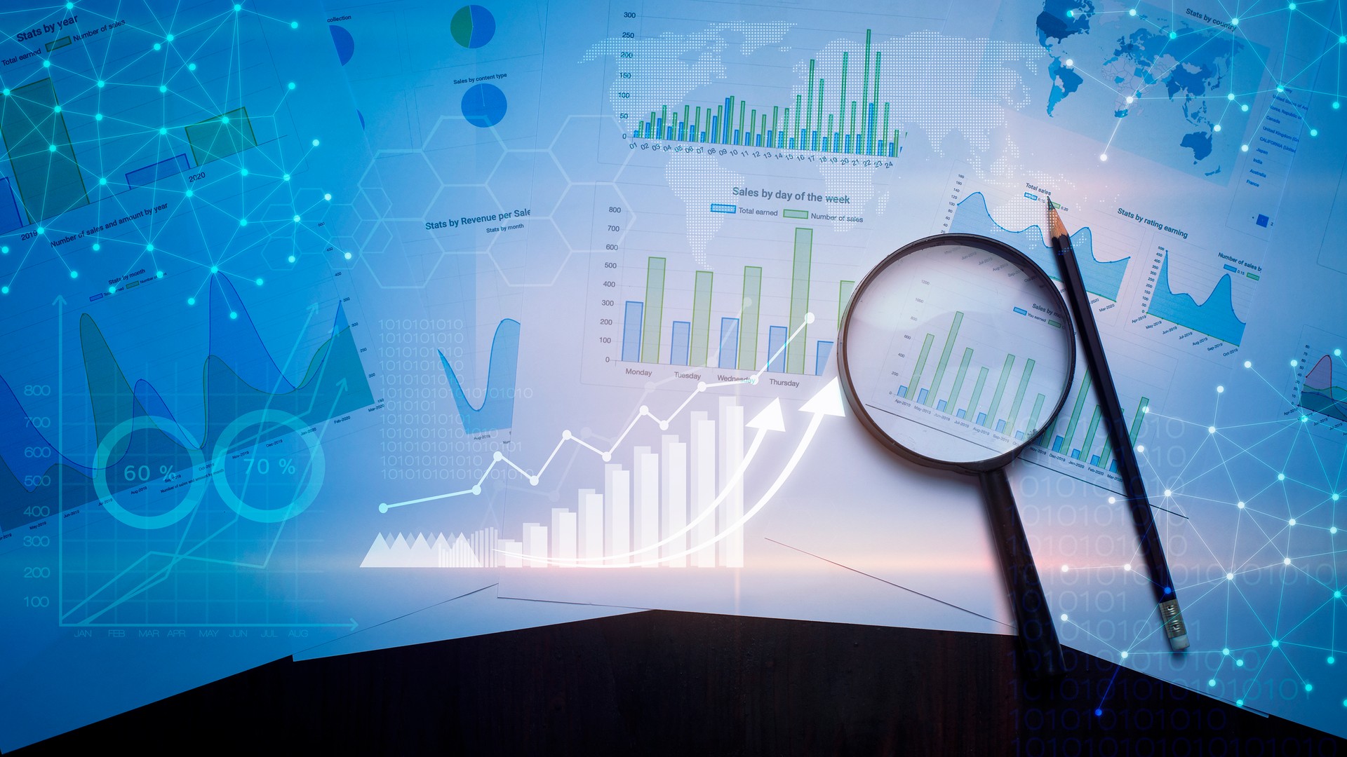 Magnifying glass and documents with analytics data lying on table , and digital virtual reality graph